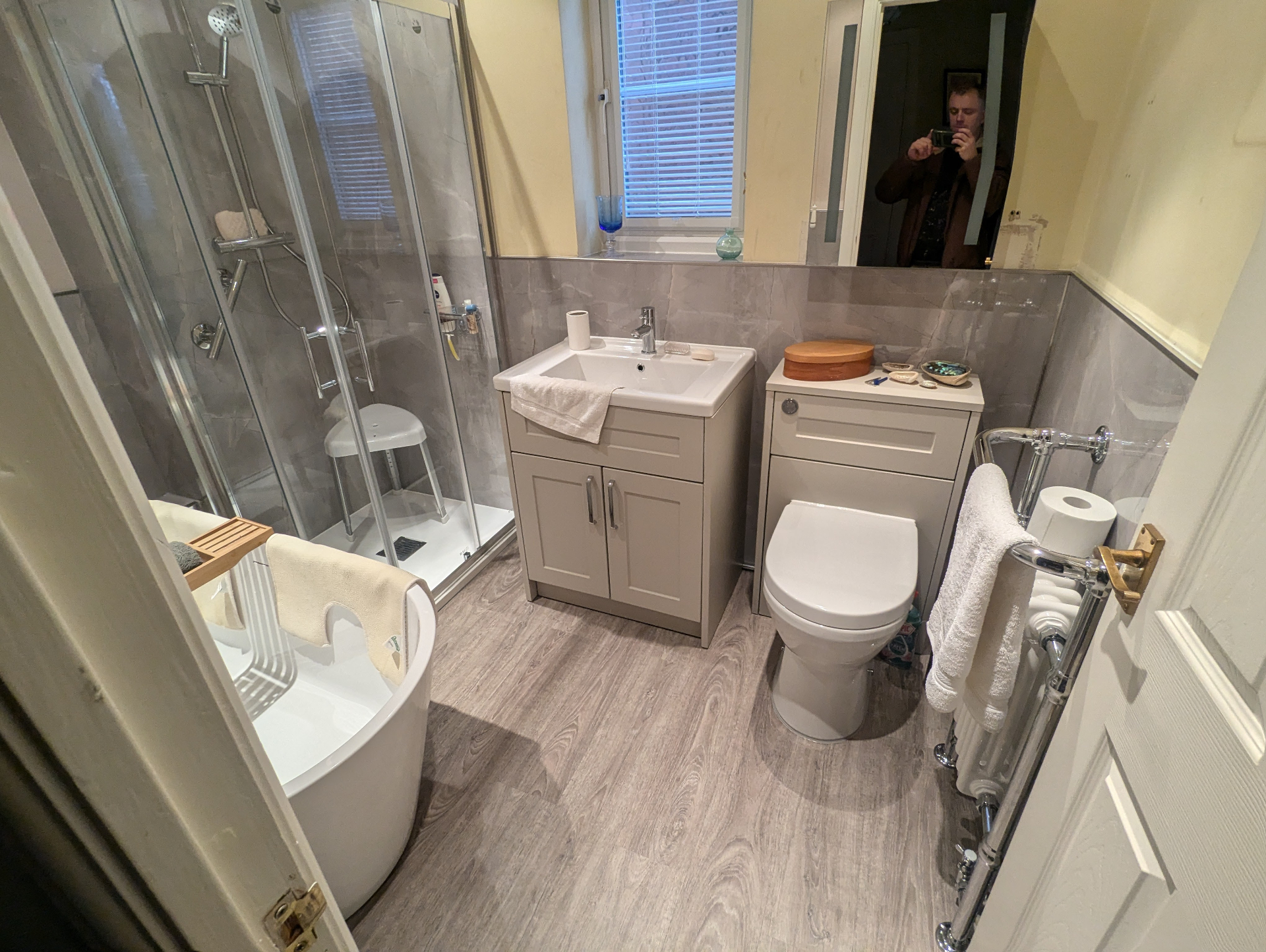 Emergency plumber repairing burst pipe