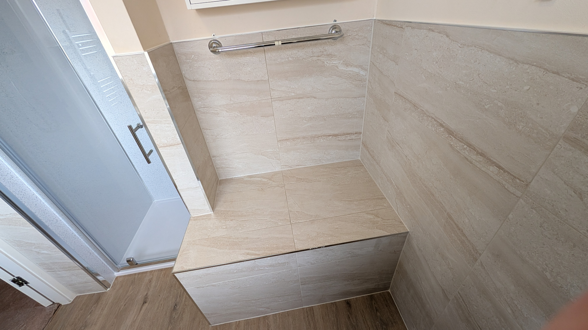 Shower with built-in tiled seat