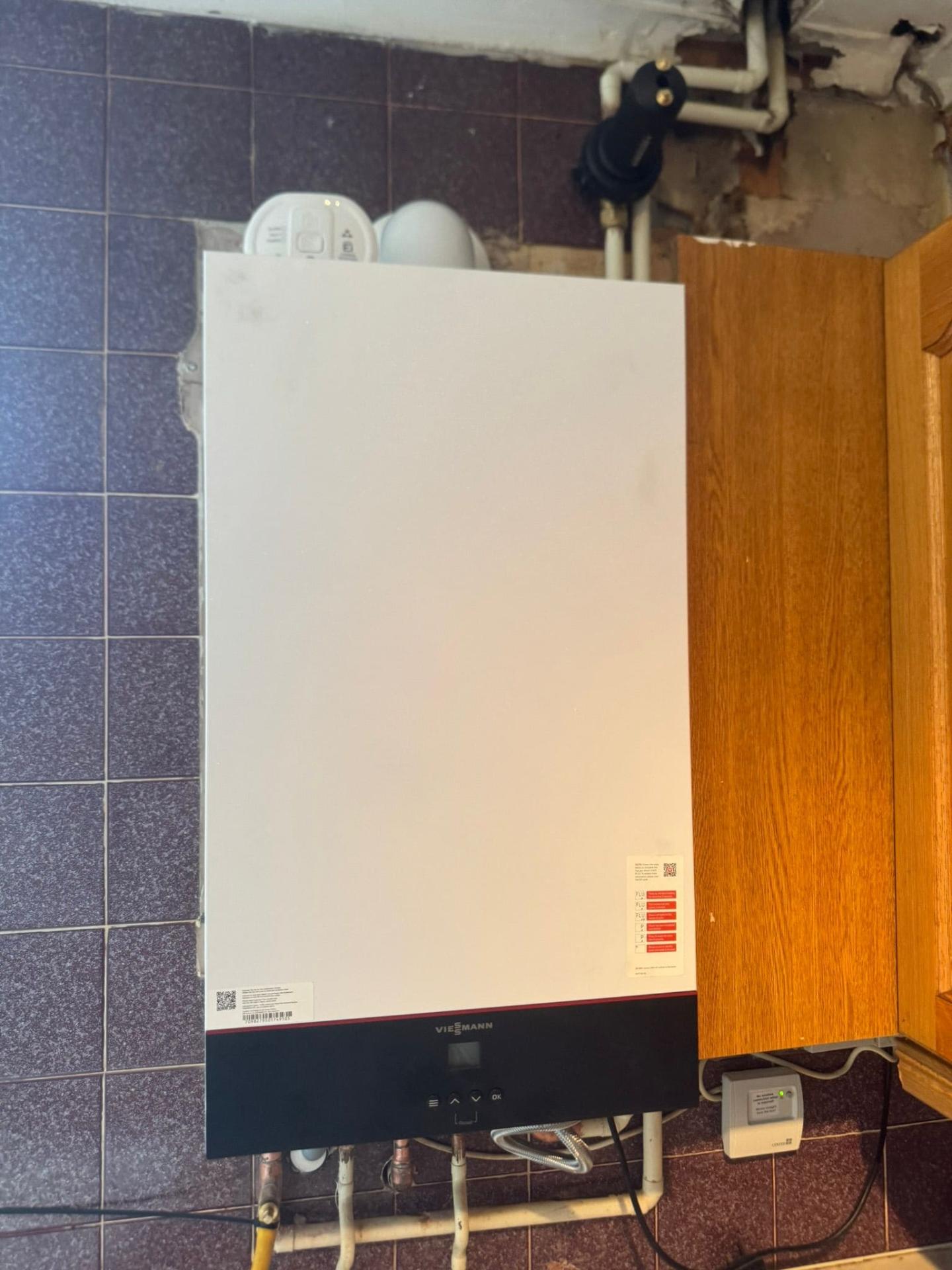 Viessmann boiler fitted in utility area