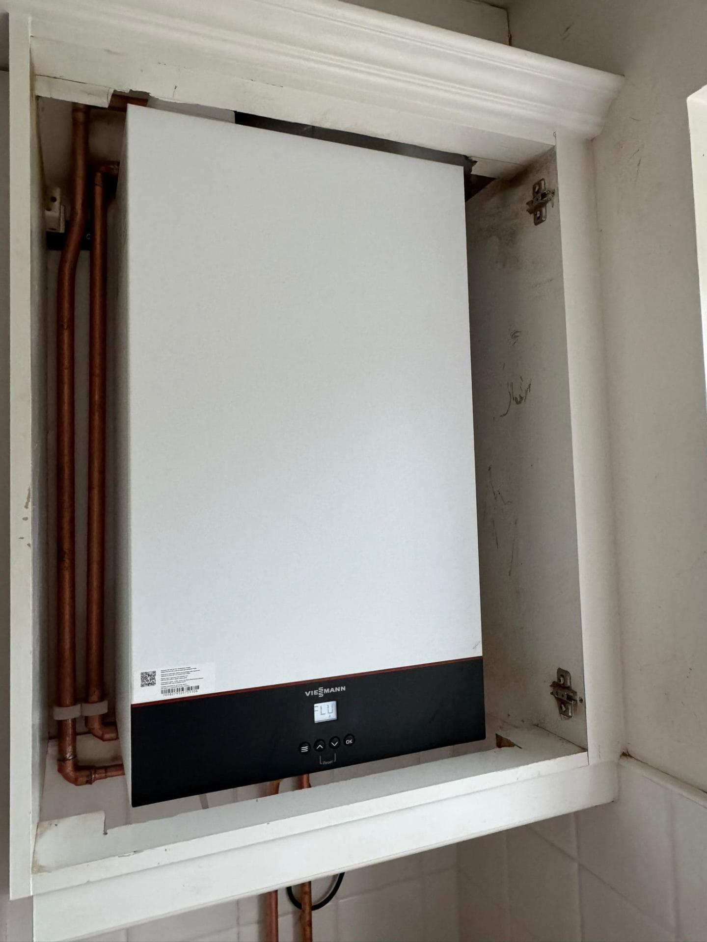 Viessmann boiler in white cabinet