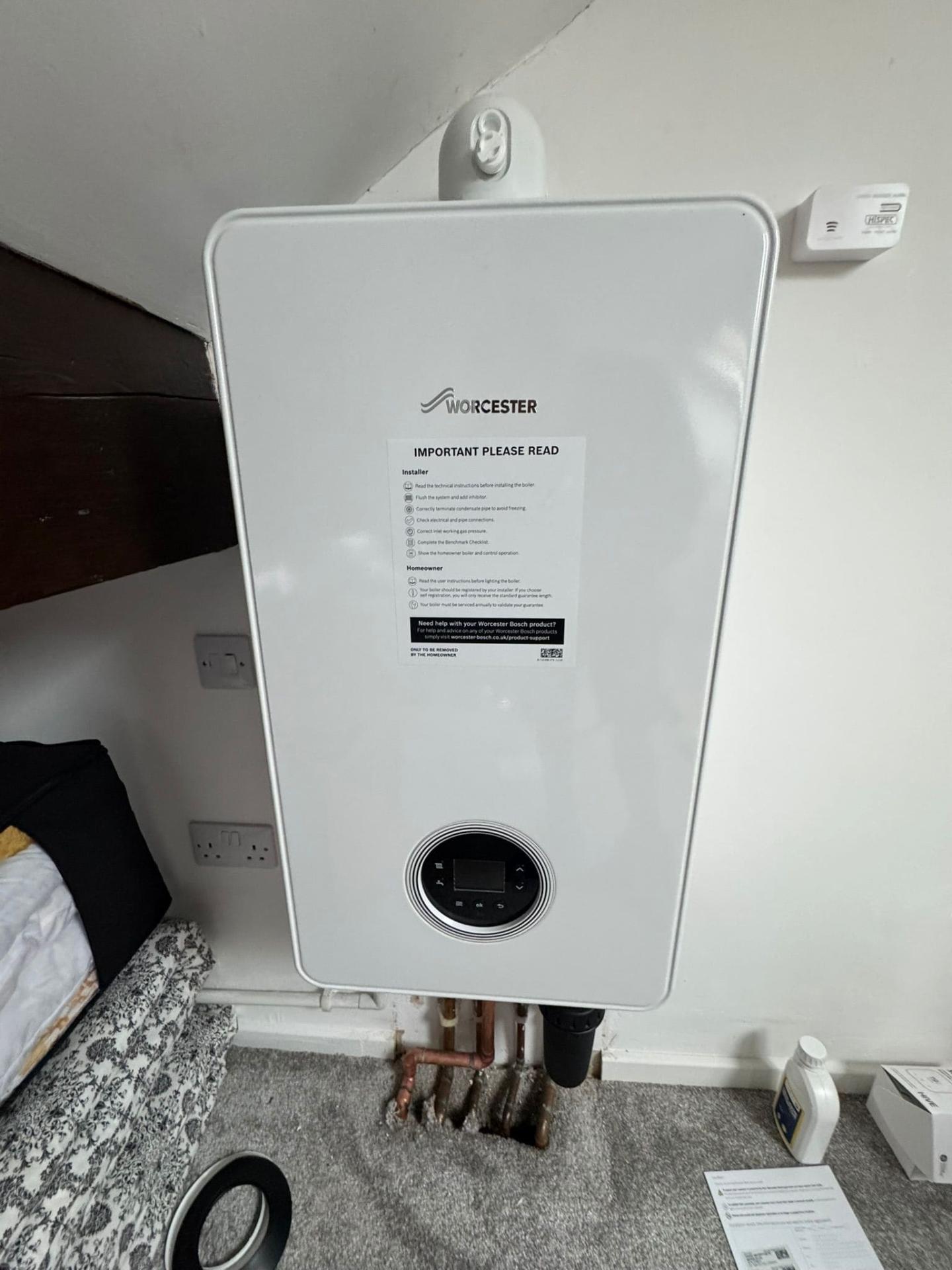 Worcester Bosch boiler installation with neat copper pipework